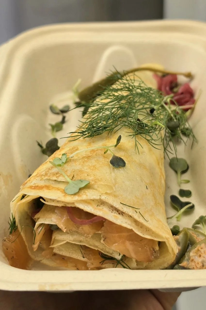 LOX Salmon crepe by Uncle Dan Crepes at Saint Maxime Coffee in Venice Beach with house cured salmon, cream cheese, pickled onions, dill, and capers