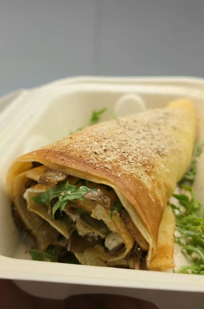 The Forager crepe by Uncle Dan Crepes in Venice Beach with mushrooms, greens, and savory filling The Forager crepe by Uncle Dan Crepes in Venice Beach with mushrooms, greens, and savory filling